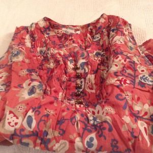 Deep pink pattern sleeveless three button shirt