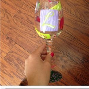 Re-list of Lolita L initial wine glass