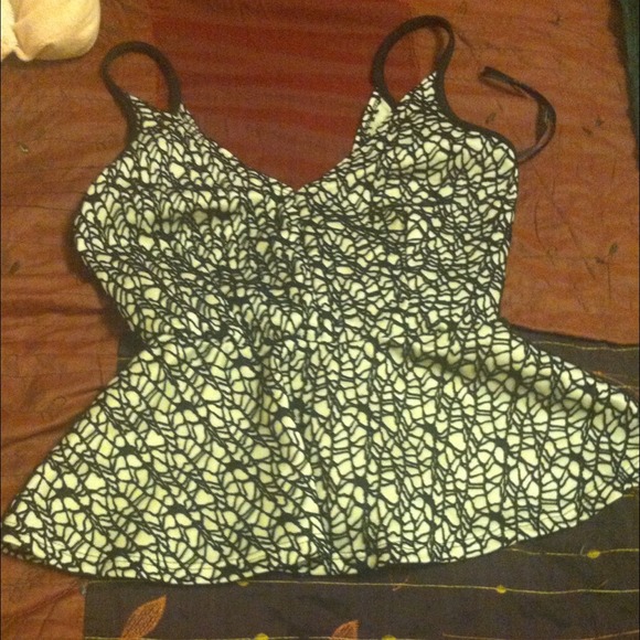 Peplum top with open back and bow