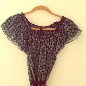 Feminine, flirty green and black top