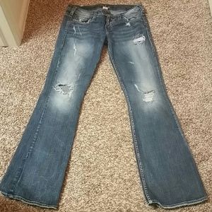 Silver destroyed jeans