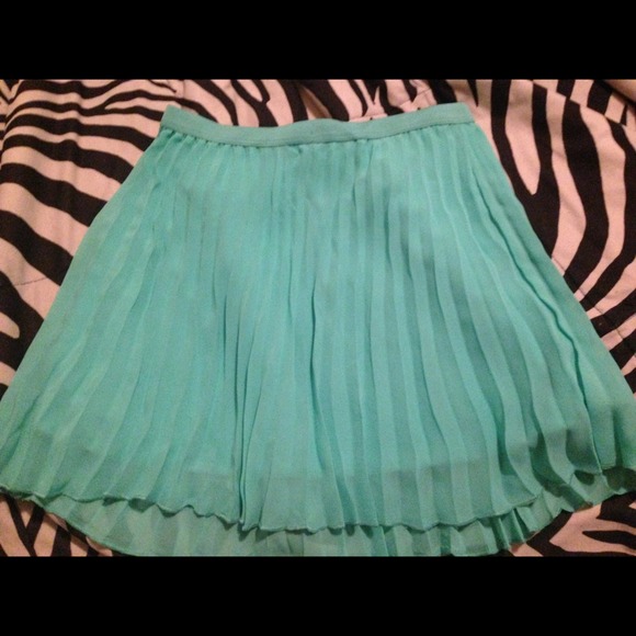 Turquoise skirt.