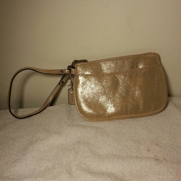 Coach gold wristlet