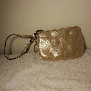 Coach gold wristlet