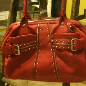 Jessica Simpson leather red/orange color handbag.