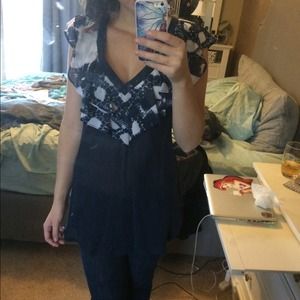 Adorable top with ruffle around the top