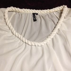 Bright white silk dress shirt.