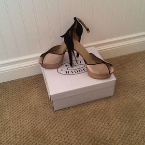 Nude and black satin heels