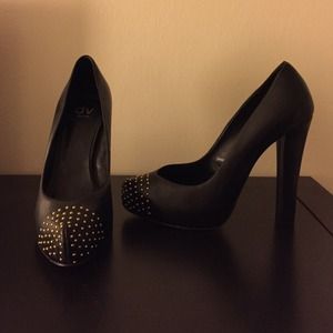Dolce Vita black studded pumps.