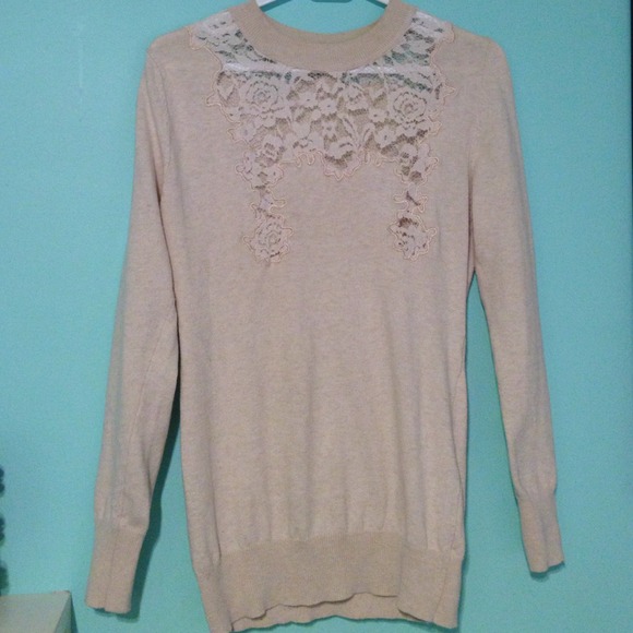 Beige sweater with lace embellishments