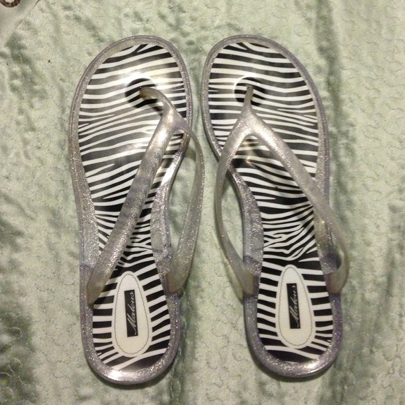 7️⃣ SALE: Jelly Zebra Flip Flops