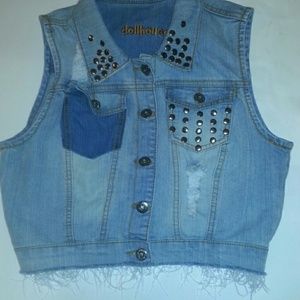 Distressed denim vest