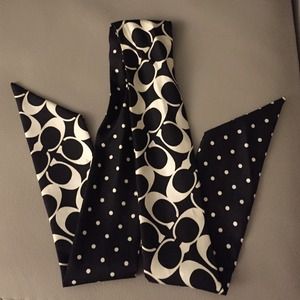 Like new, gently used Coach silk pony tail scarf.