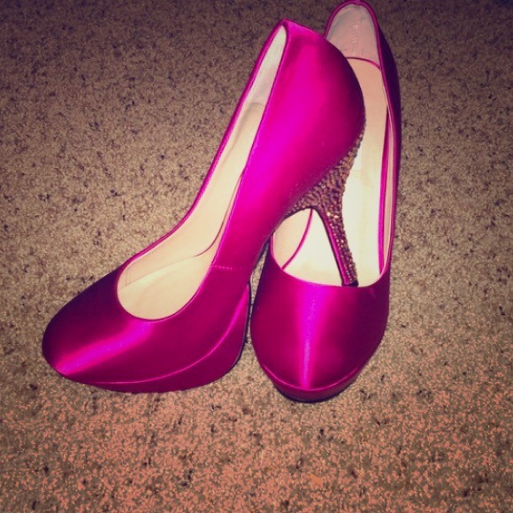 Fuchsia pumps with rhinestone encrusted heel