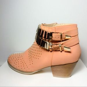 Coral booties wit gold stud details and buckles