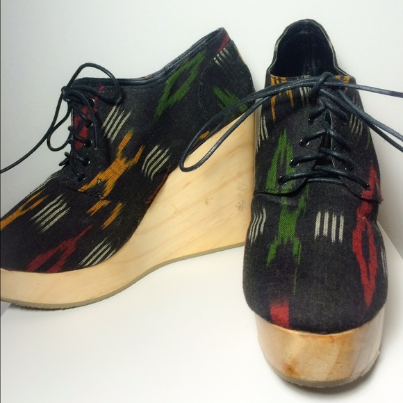 Deena and Ozzy canvas lace up wedge booties