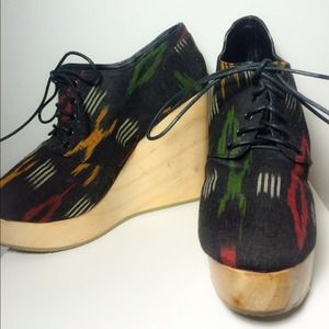 Deena and Ozzy canvas lace up wedge booties