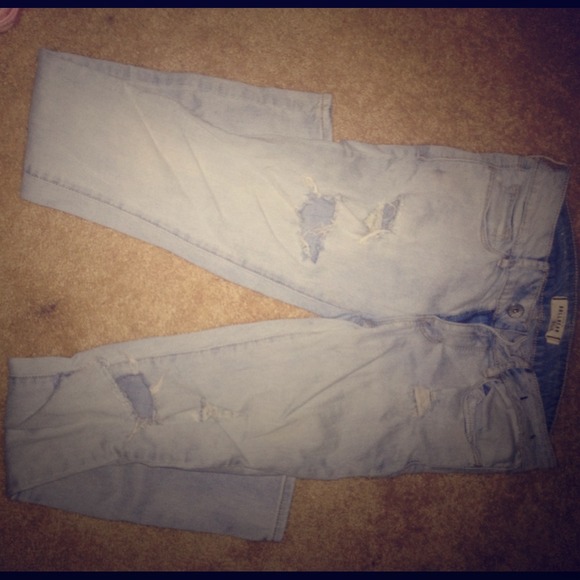 Light blue denim ripped jeans