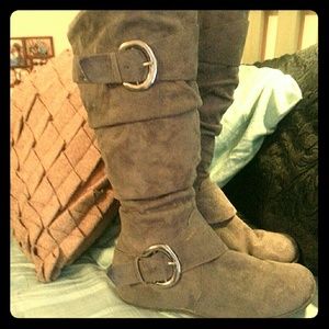 pair of buckled boots