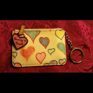 Authentic Dooney & Bourke coin purse yellow hearts