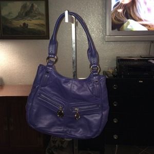 Never used Tignanello dark purple purse. Leather