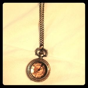 Long necklace with a working clock