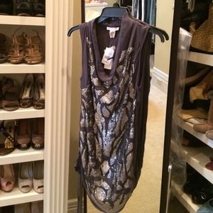 Gold Hawk sequined top.