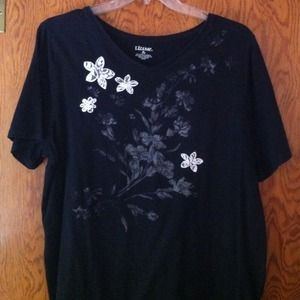 Black v-neck Tshirt with flowers.