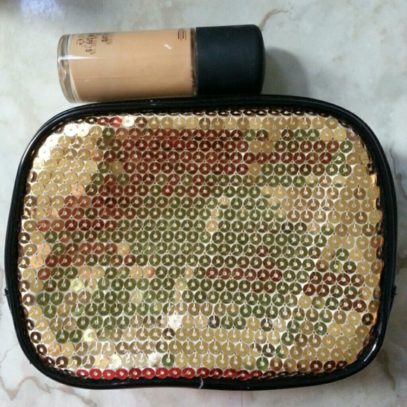 $4pypl: Gold sequence cosmetic bag