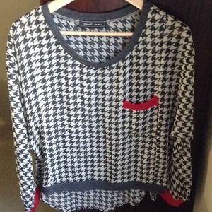 Hi low mesh like,long sleev red details.