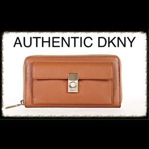 NEW DKNY SOFT LEATHER ZIP AROUND WALLET. ORANGE