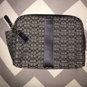 Coach small cosmetic bag, used a few times.