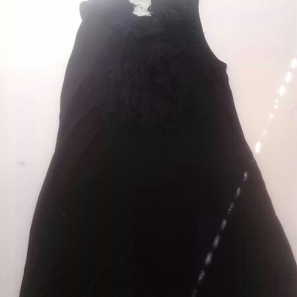 Black ruffle long shirt or short dress.