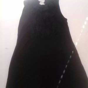 Black ruffle long shirt or short dress.