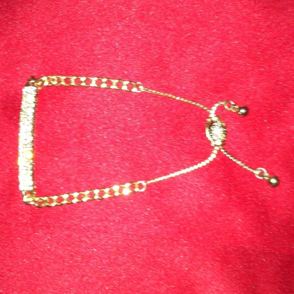 Gold and rhinestone bracelet