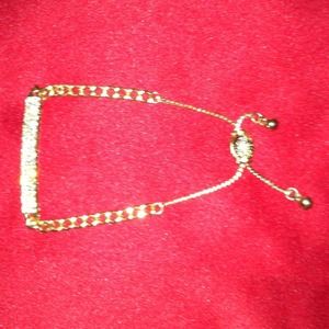 Gold and rhinestone bracelet