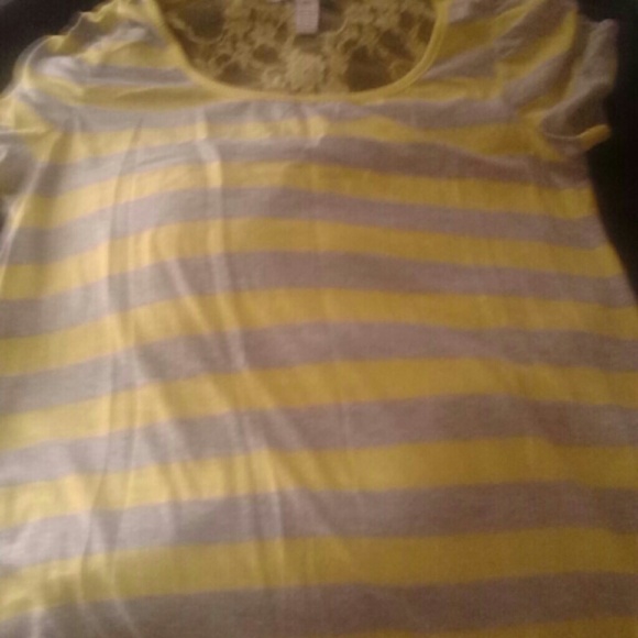 Bright yellow and grey shirt.