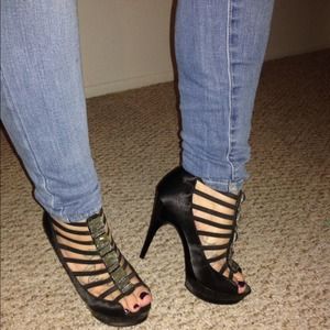Caged in black sayin heels