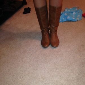 Tan riding boots and black riding boots bundled.