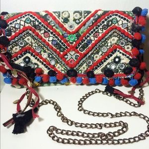 Moroccan inspired clutch with detachable strap