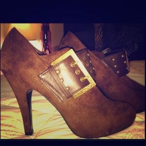 Brand New brown booties.  Super cute.