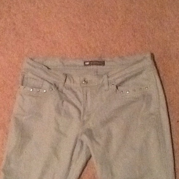 Gray jeans with spike pockets