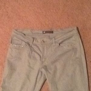 Gray jeans with spike pockets