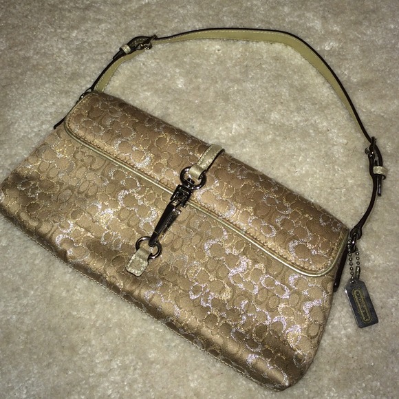 Small clutch by Coach