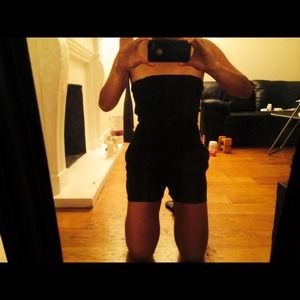 Black with circles of sparkles romper