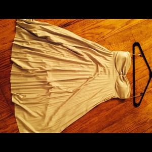 Strapless glittery gold dress with pleated bottom