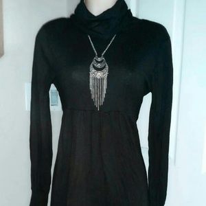 Long sleeved turtle neck black dress
