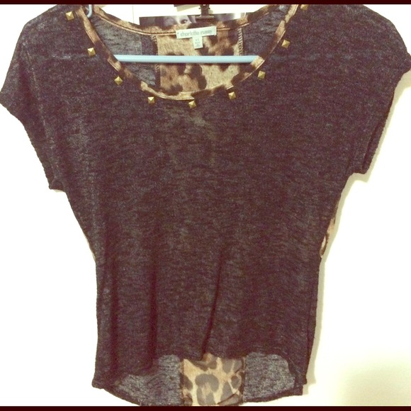 Black blouse with cheetah cross on back. 😜