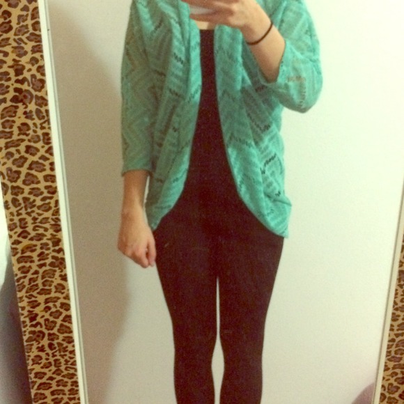 Teal sweater/jacket with pattern. ☺️