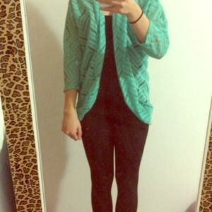 Teal sweater/jacket with pattern. ☺️